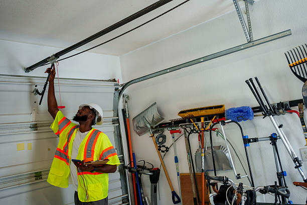 Professional Garage Door Panel Replacement technician working in Saranac, MI
